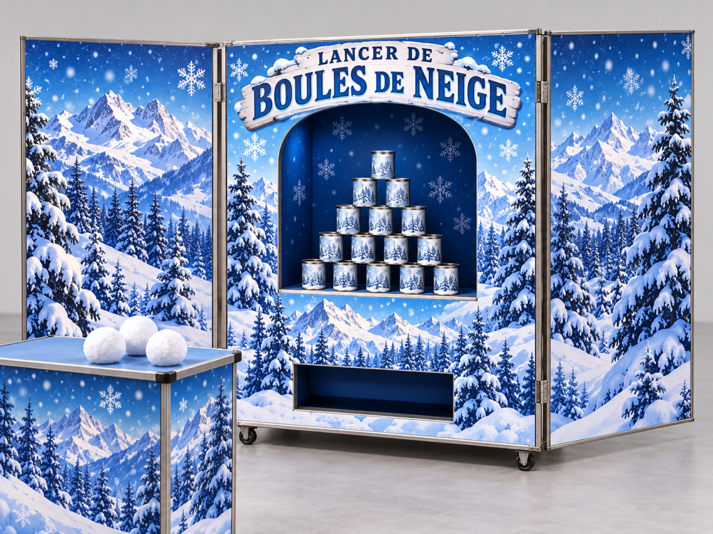 Stand de lancer de boules de neige avec décor de montagnes enneigées, pyramide de boîtes et boules blanches